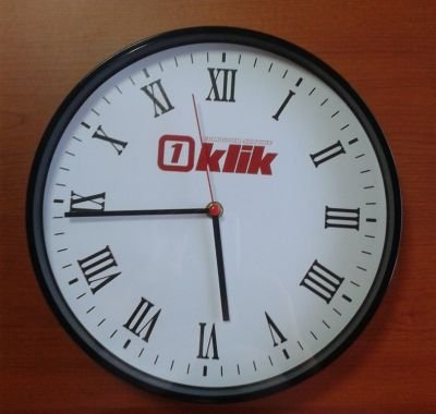 Виготовлення годинників та горняток з логотипом для компанії "Klik"